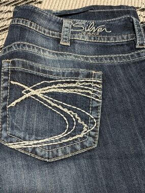 Silver Jeans Women's Dark Blue Bootcut Jeans with White Embroidered Pocket